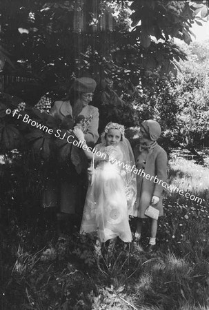 CARMEL BOWERS AT ALPHONOUS COURT DRUMCONDRA ON HER FIRST COMMUNION WAY CATH MARIE